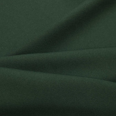 Ткань костюмная 21010 2076, 225 гр/м2, шир.150см, цвет т.зеленый - купить в Новошахтинске. Цена 390.73 руб.